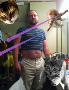Actor Tom Mousey looking sexy. With laser cats.